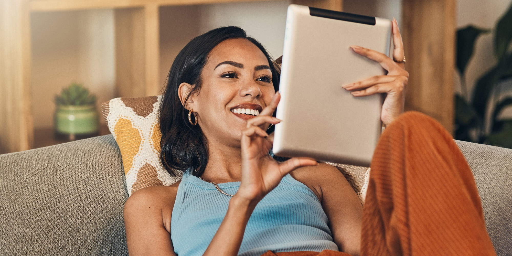 Woman scrolling on an ipad